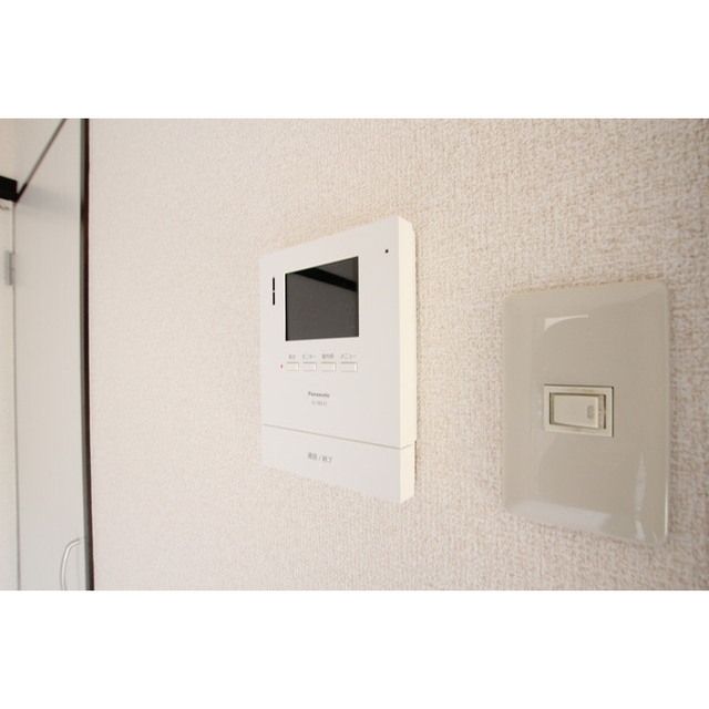 �y�Z�L�����e�B�z�@